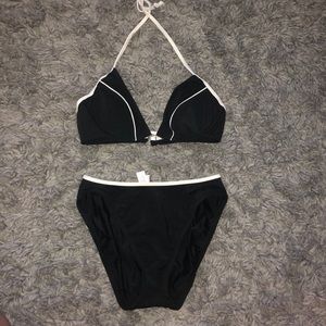 VS bikini plus a skirt